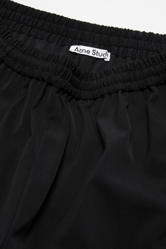 Acne Studios Figurnahe Hose Blitzangebot