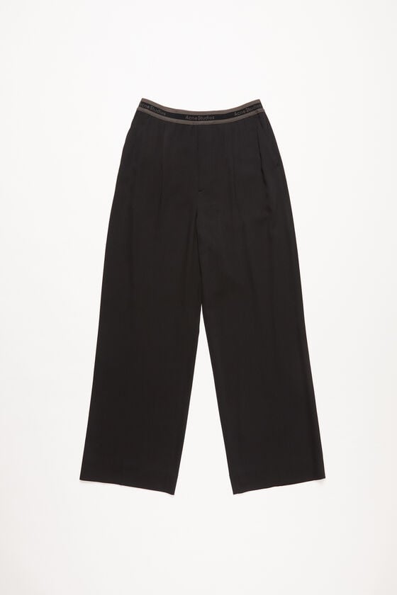 Acne Studios Hose mit Logo-Tape Bis zu 65% Rabatt